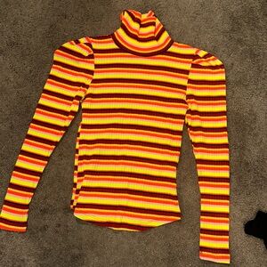 Turtlenecks long sleeve formal wear. Size Small. Fits true to size.